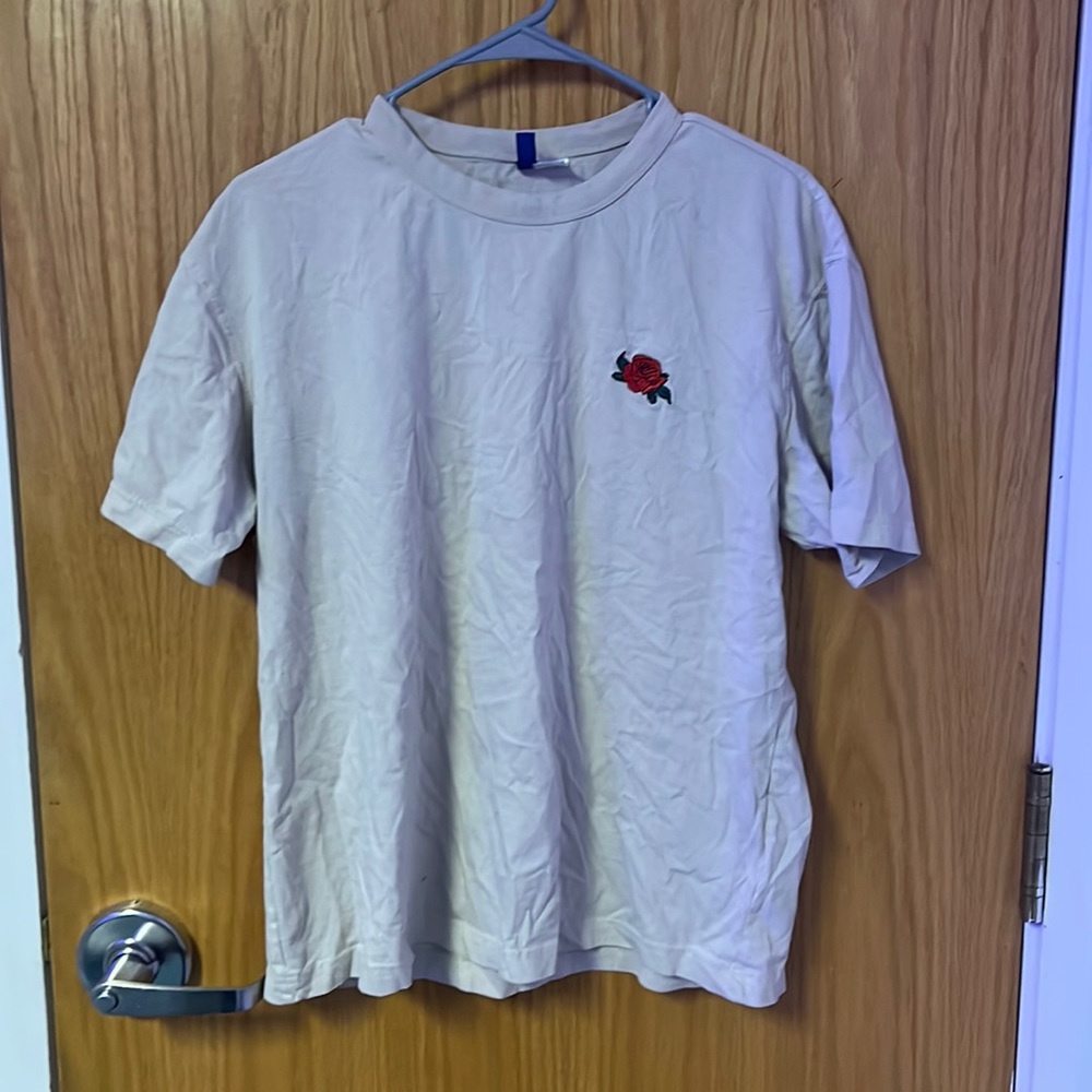 Tan shirt with rose
